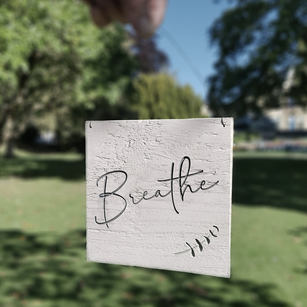 Engraved Breathe Sign