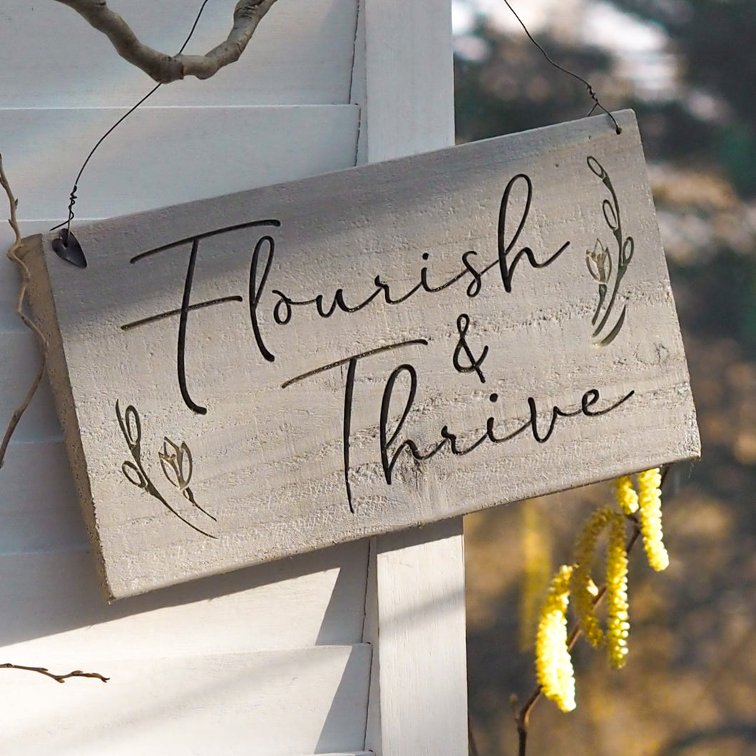 Engraved Flourish and Thrive Sign